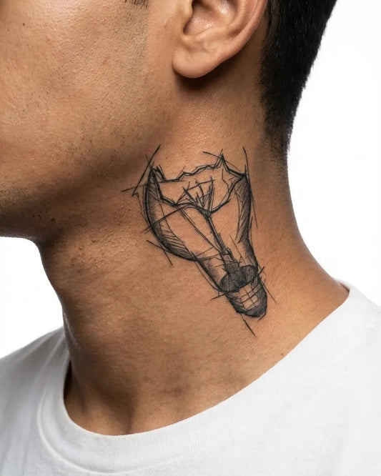 INKON Foco Roto tatuaje semi-permanente aplicado en un hombre – diseño de 3 x 4 in (7x10cm), apariencia de tinta realista, dura 10 días